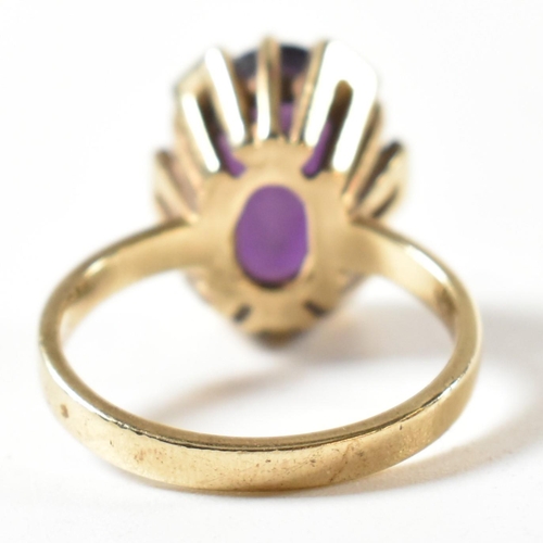 138 - A hallmarked 9ct gold and amethyst ring. The ring bearing import hallmark for London 1979. Weight 5g... 