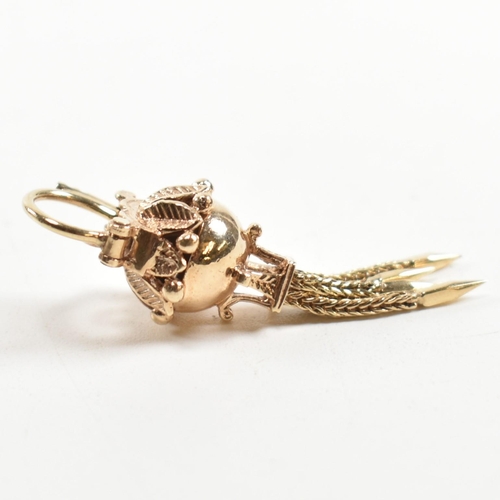 139 - A hallmarked 9ct gold antique style bauble clasp. The clasp having four tassels with spiked ends sur... 