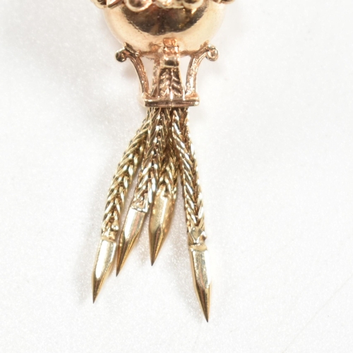 139 - A hallmarked 9ct gold antique style bauble clasp. The clasp having four tassels with spiked ends sur... 