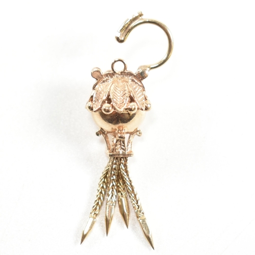 139 - A hallmarked 9ct gold antique style bauble clasp. The clasp having four tassels with spiked ends sur... 