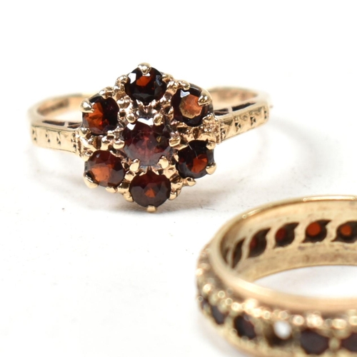 141 - Three 9ct yellow gold and garnet rings. The rings to include a hallmarked 9ct gold and oval cut garn... 