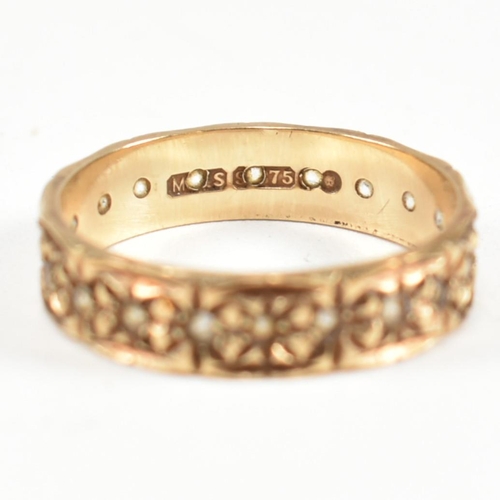 144 - A hallmarked 9ct gold and white stone eternity ring. The eternity ring set all around with round cut... 