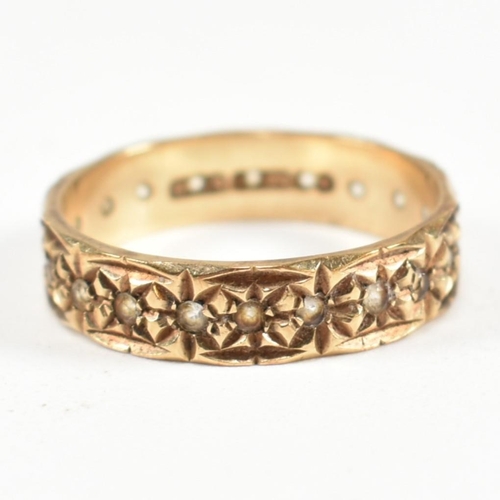 144 - A hallmarked 9ct gold and white stone eternity ring. The eternity ring set all around with round cut... 