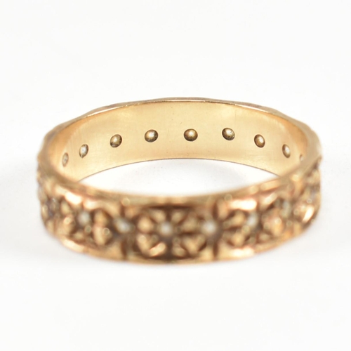 144 - A hallmarked 9ct gold and white stone eternity ring. The eternity ring set all around with round cut... 