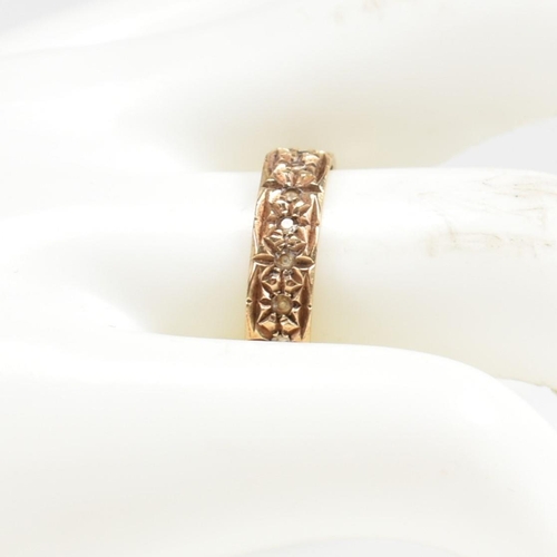 144 - A hallmarked 9ct gold and white stone eternity ring. The eternity ring set all around with round cut... 