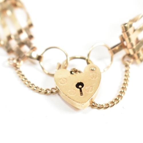 149 - A hallmarked 9ct gold gate link bracelet with a heart padlock clasp. The hallmarked gate link bracel... 