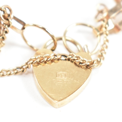 149 - A hallmarked 9ct gold gate link bracelet with a heart padlock clasp. The hallmarked gate link bracel... 