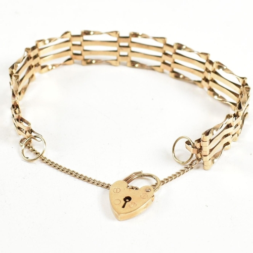 149 - A hallmarked 9ct gold gate link bracelet with a heart padlock clasp. The hallmarked gate link bracel... 