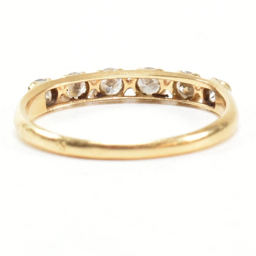 150 - A gold and diamond six stone ring. The ring set with six round brilliant cut diamonds. Estimated tot... 