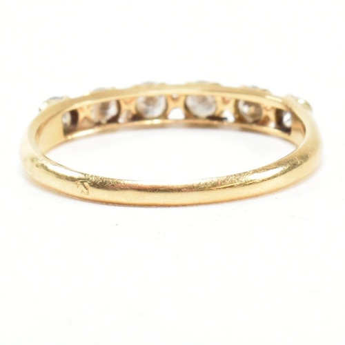 150 - A gold and diamond six stone ring. The ring set with six round brilliant cut diamonds. Estimated tot... 