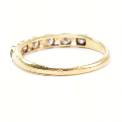 150 - A gold and diamond six stone ring. The ring set with six round brilliant cut diamonds. Estimated tot... 