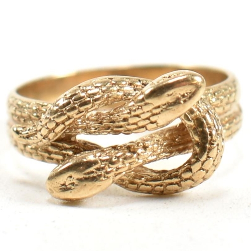 152 - A hallmarked 9ct gold entwined snake ring. The ring having a double entwined snake design with cross... 