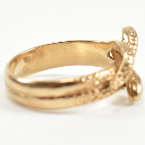 152 - A hallmarked 9ct gold entwined snake ring. The ring having a double entwined snake design with cross... 