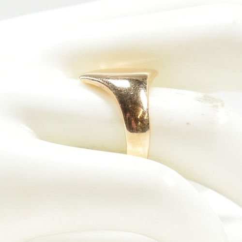 153 - An early 20th century hallmarked 9ct gold signet ring AF. The 9ct gold navette signet ring having a ... 