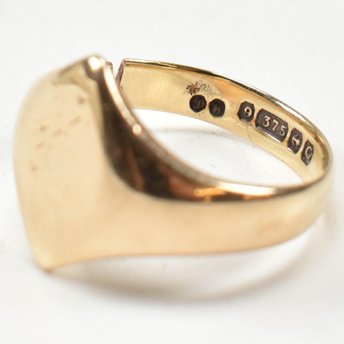 153 - An early 20th century hallmarked 9ct gold signet ring AF. The 9ct gold navette signet ring having a ... 