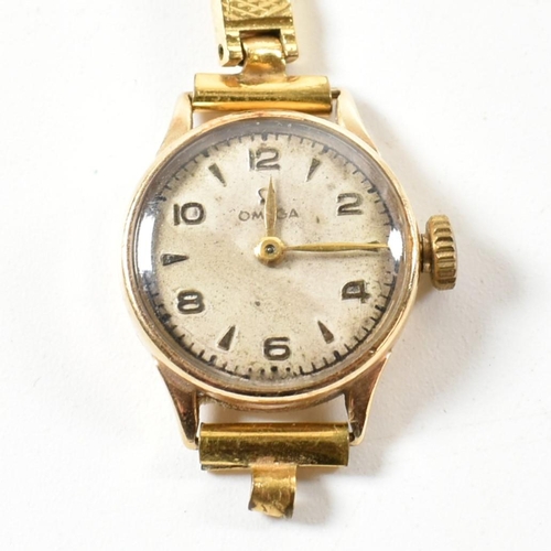 154 - A hallmarked 9ct gold omega watch on gilded Elgolux plated strap. The interior of the case hallmarke... 