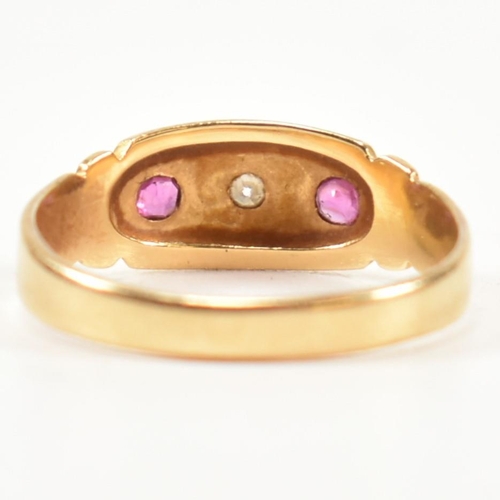 158 - A Victorian hallmarked 18ct gold, ruby and diamond dome ring. The three stone gypsy style ring havin... 