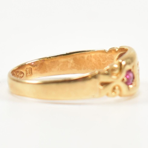 158 - A Victorian hallmarked 18ct gold, ruby and diamond dome ring. The three stone gypsy style ring havin... 