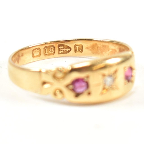 158 - A Victorian hallmarked 18ct gold, ruby and diamond dome ring. The three stone gypsy style ring havin... 