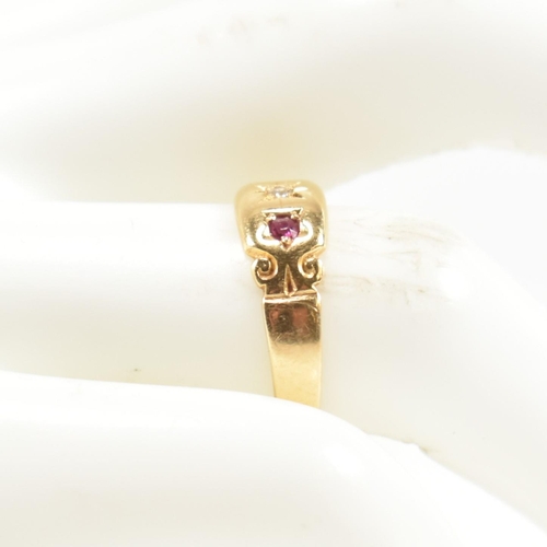 158 - A Victorian hallmarked 18ct gold, ruby and diamond dome ring. The three stone gypsy style ring havin... 