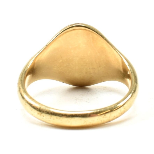 167 - A hallmarked 18ct gold signet ring. The signet ring having an oval vacant cartouche to tapering shan... 