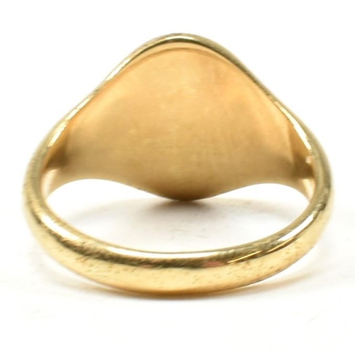 167 - A hallmarked 18ct gold signet ring. The signet ring having an oval vacant cartouche to tapering shan... 