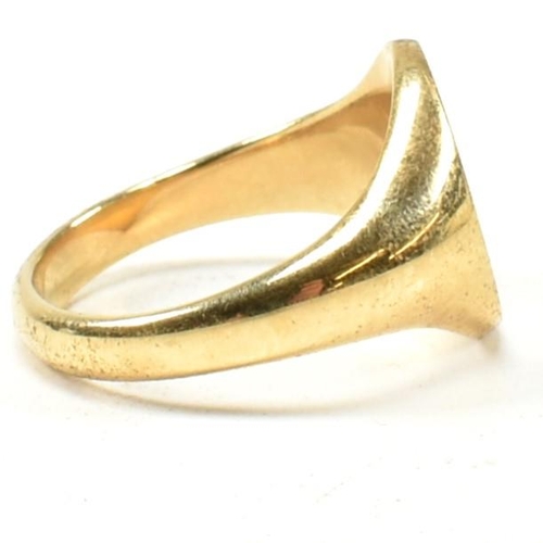 167 - A hallmarked 18ct gold signet ring. The signet ring having an oval vacant cartouche to tapering shan... 