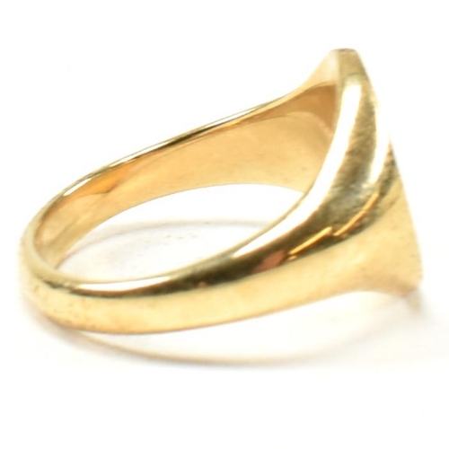 167 - A hallmarked 18ct gold signet ring. The signet ring having an oval vacant cartouche to tapering shan... 