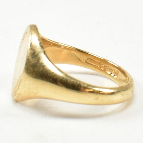 167 - A hallmarked 18ct gold signet ring. The signet ring having an oval vacant cartouche to tapering shan... 