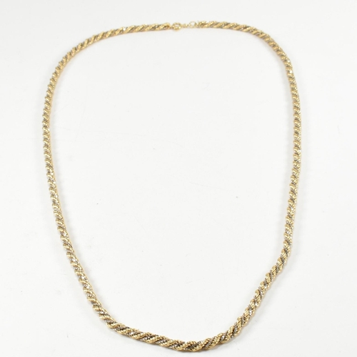 176 - An Italian 18ct gold rope twist chain necklace. The necklace formed with rope twist link with entwin... 