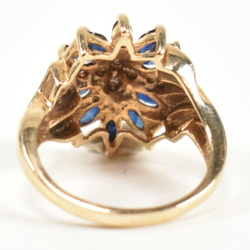 178 - A hallmarked 9ct gold, sapphire and diamond cluster ring. The ring having a central cluster of round... 