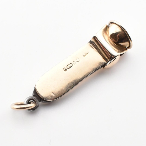 179 - A hallmarked 9ct gold cigar cutter. The cigar cutter having partially legible hallmarks. Measures 4.... 