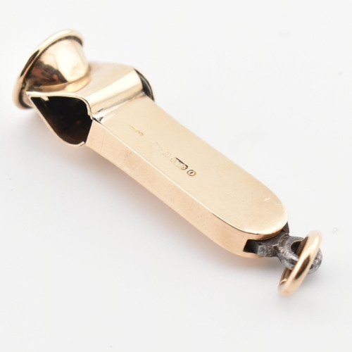 179 - A hallmarked 9ct gold cigar cutter. The cigar cutter having partially legible hallmarks. Measures 4.... 