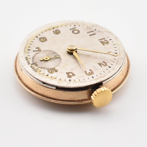 189 - A 9ct gold hallmarked ladies dress cocktail watch. Silvered dial with Arabic numbers. Set to a 9ct /... 