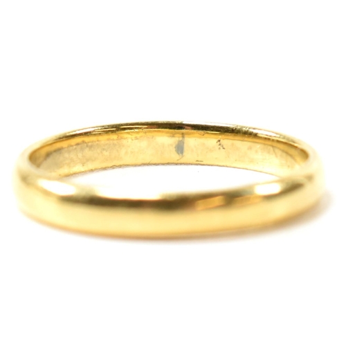 190 - A hallmarked 22ct gold band ring. The ring hallmarked Birmingham. Weight 2.4g. Size K.5. All weights... 