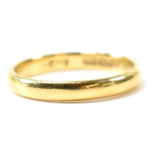 190 - A hallmarked 22ct gold band ring. The ring hallmarked Birmingham. Weight 2.4g. Size K.5. All weights... 