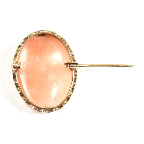 196 - A hallmarked 9ct gold cameo brooch pin. The brooch pin having a bezel set cameo of a woman's profile... 