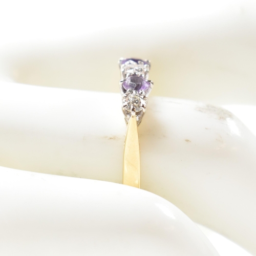 204 - An 18ct gold, amethyst and diamond five stone ring. The ring having three six claw set round cut dia... 