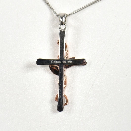 205 - A hallmarked silver and rose gold Clogau cross pendant necklace. The Clogau necklace having a sterli... 