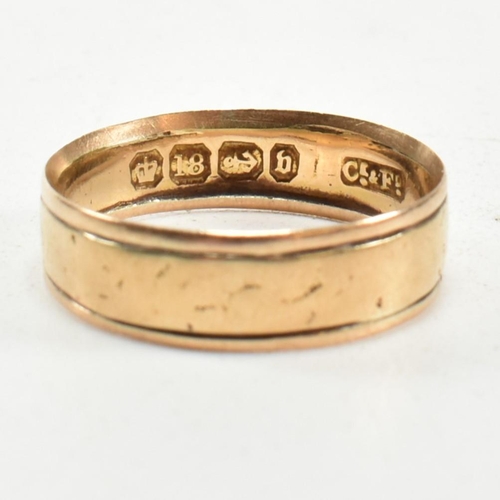 206 - A Victorian hallmarked 18ct gold band ring. The band ring having two parallel engraved lines. Hallma... 