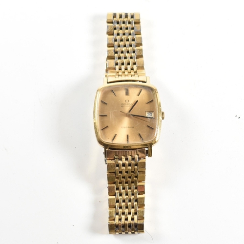 208 - An Omega Genève triple gold metal gentleman's wrist watch. The Omega Genève watching having gold lac... 