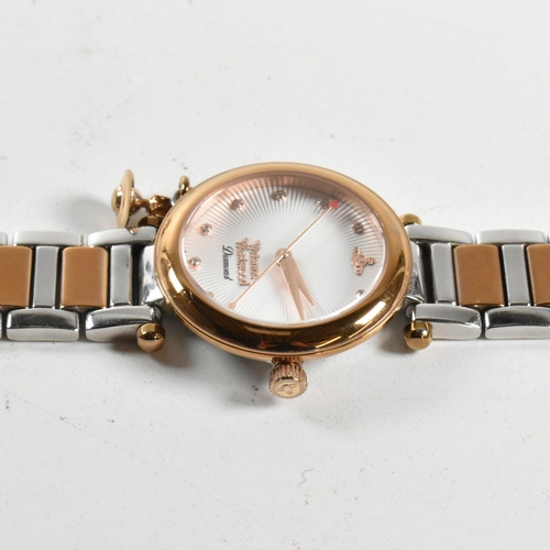 210 - A contemporary Vivienne Westwood wristwatch. Bi-colour stainless steel case and strap with decorativ... 