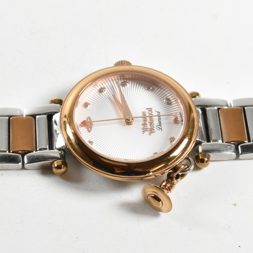 210 - A contemporary Vivienne Westwood wristwatch. Bi-colour stainless steel case and strap with decorativ... 