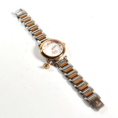 210 - A contemporary Vivienne Westwood wristwatch. Bi-colour stainless steel case and strap with decorativ... 