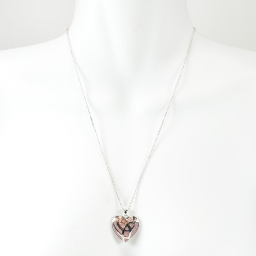 213 - A hallmarked silver Clogau Celtic heart pendant necklace. The heart pendant necklace having a trinit... 