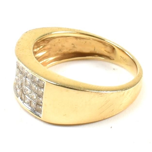 219 - An 18ct gold and diamond cluster ring. The ring having a rectangular head set with four rows of ten ... 