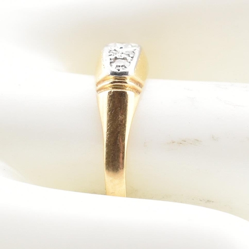 22 - A cased hallmarked 18ct gold and diamond ring. The ring set with three graduating round cut diamonds... 