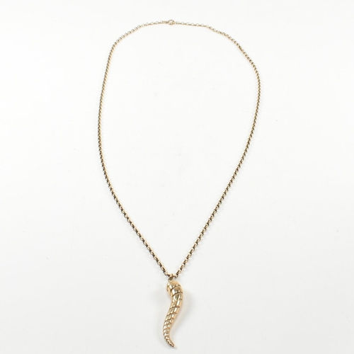 224 - A hallmarked 9ct gold pendant necklace. The necklace strung with a 9ct gold cornicello/horn of plent... 