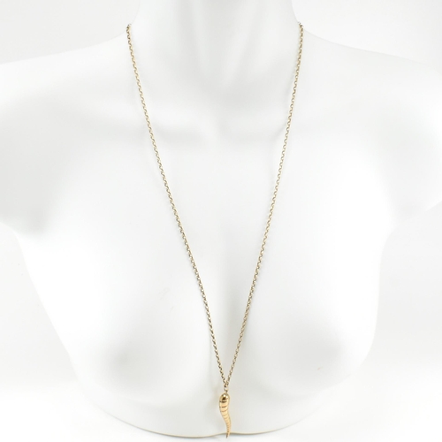 224 - A hallmarked 9ct gold pendant necklace. The necklace strung with a 9ct gold cornicello/horn of plent... 