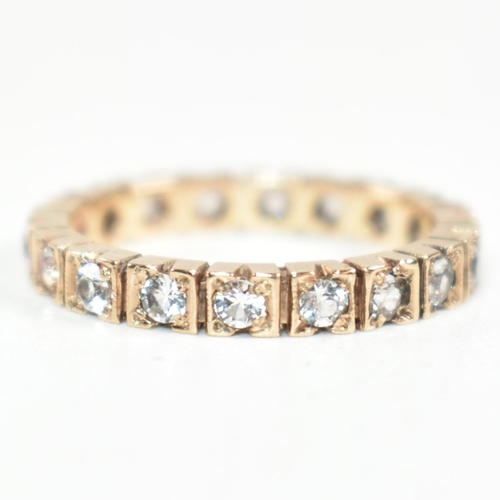 229 - A 9ct rose gold and diamond eternity ring. The ring set all around with round cut diamonds. Marked 9... 